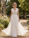 Lacey Bridal Ltd. Ambrosia A-line wedding gown with a sheer lace bodice, V-neckline, and flowing chiffon skirt.