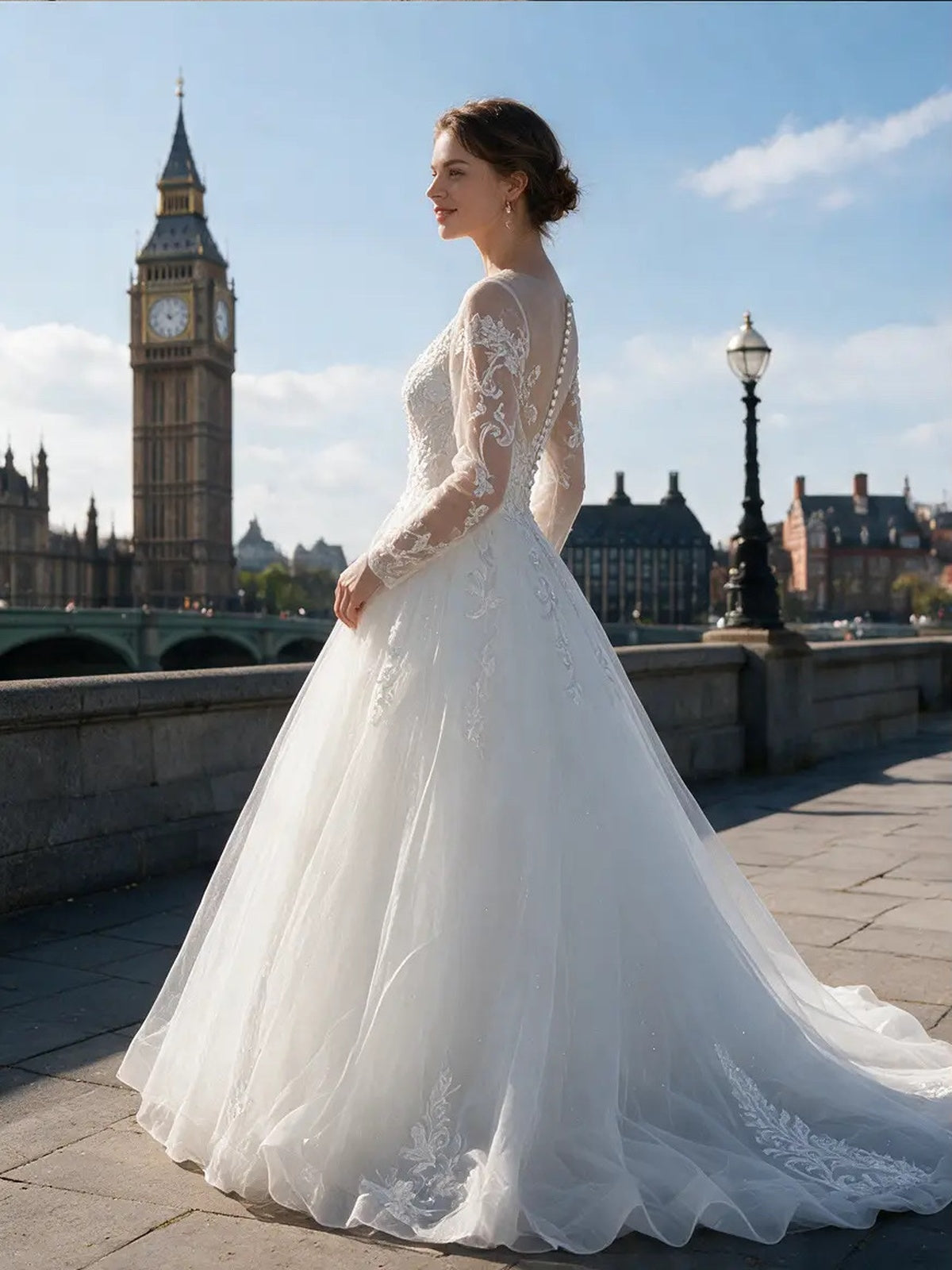 Lacey Bridal Ltd. ANNA ball gown with illusion bodice, long lace sleeves, and tulle skirt near Big Ben in London.