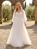 Lacey Bridal Ltd. Anthea bohemian A-line wedding gown with illusion neckline, balloon sleeves, and floral lace details.