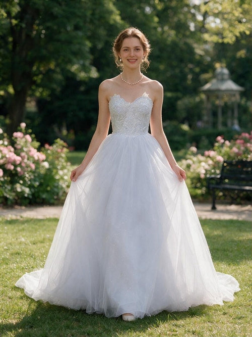 Lacey Bridal Ltd. Arabella strapless sweetheart wedding gown with floral lace bodice and layered tulle skirt in garden