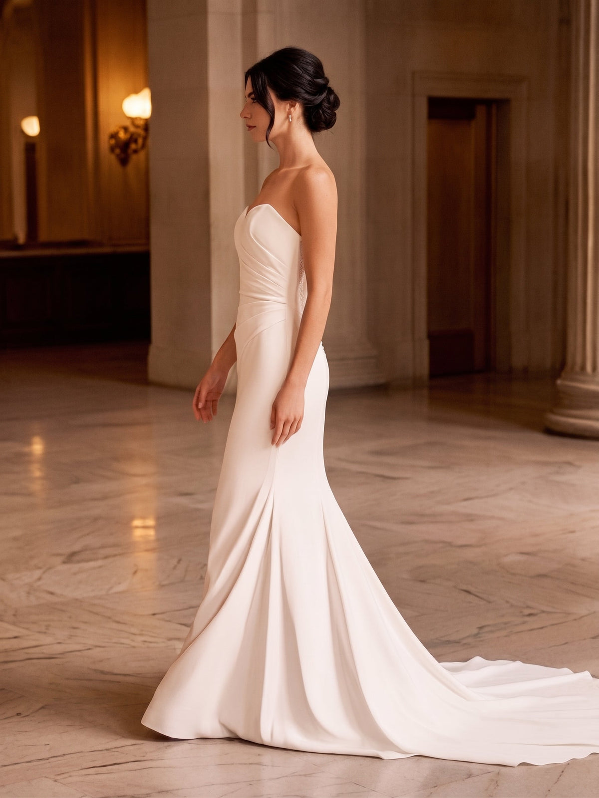 Lacey Bridal Ltd. Arielle mermaid wedding gown in white stretch crepe with a strapless sweetheart neckline and train.