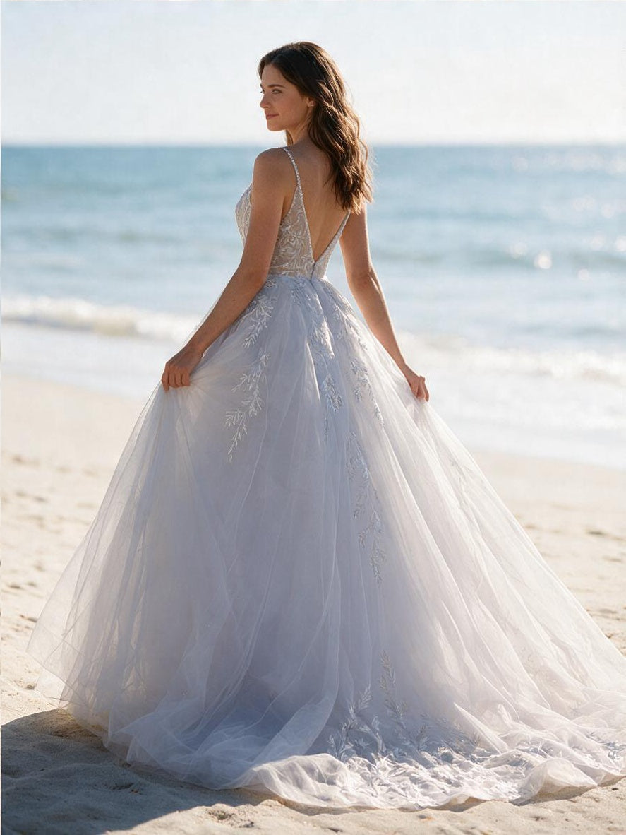 Lacey Bridal Ltd. Aurelia A-line wedding dress with sequin leaf embroidery, illusion v-back, and glitter tulle skirt.