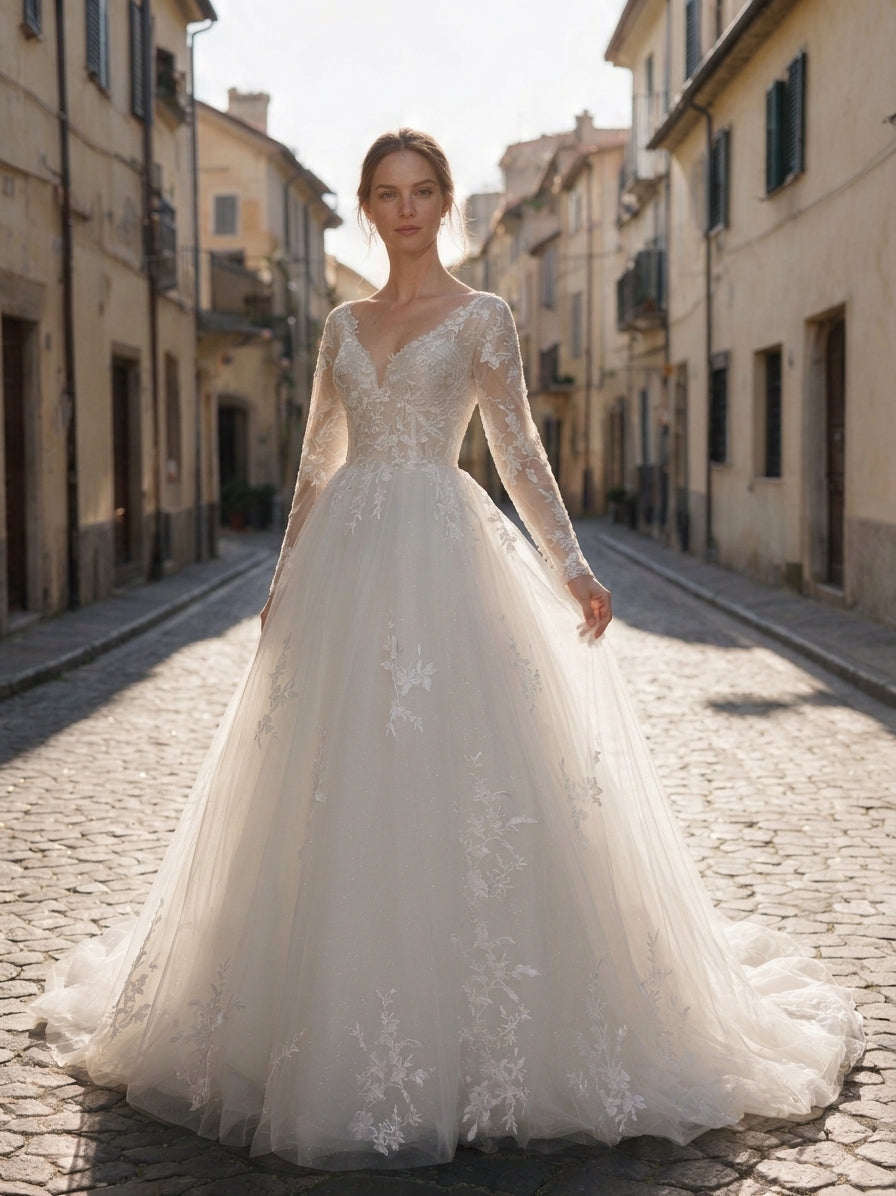 Lacey Bridal Ltd. Cassandra A-line wedding gown with floral embroidery, illusion sleeves, and a tulle skirt.
