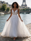 Lacey Bridal Ltd. Corinna A-line wedding gown with lace bodice, plunge V-neck, and tulle skirt by the Seine in Paris.