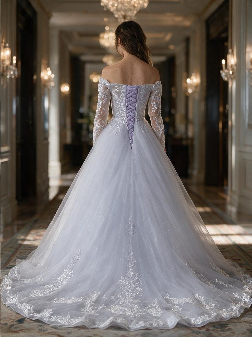 Lacey Bridal Ltd. Cornelia ball gown with off-the-shoulder lace sleeves, corset back, and tulle chapel train.