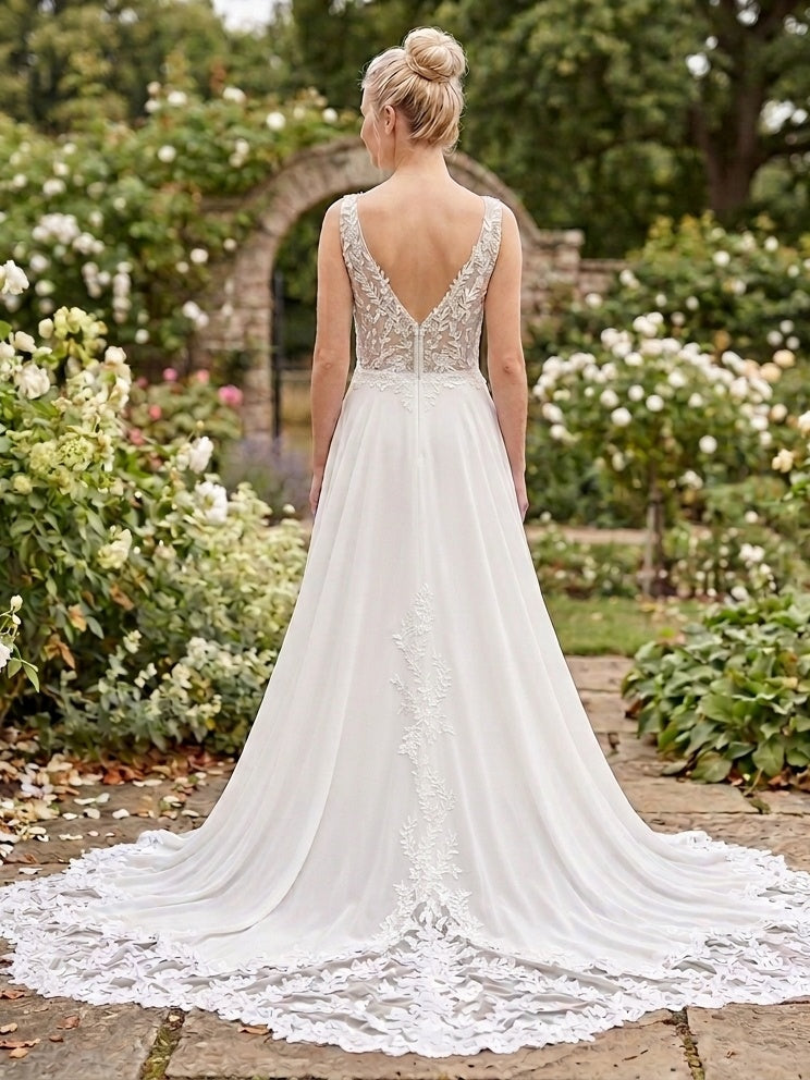 Lacey Bridal Ltd. Florence chiffon wedding gown with low V-back, botanical embroidery, and scalloped lace train.