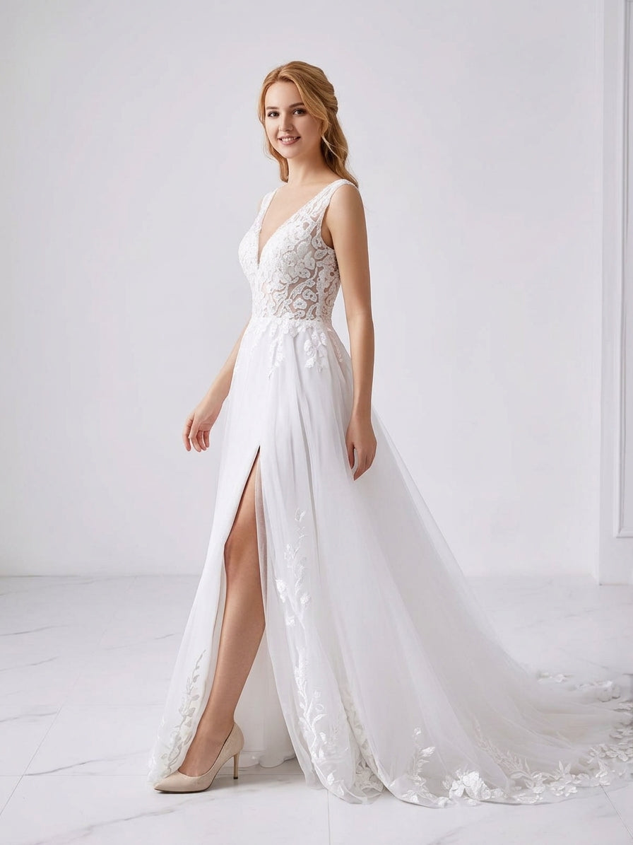 Lacey Bridal Ltd. Francesca A-line wedding gown with plunging V-neck, floral lace bodice, and tulle skirt with slit.