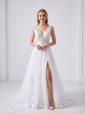 Lacey Bridal Ltd. Francesca A-line wedding gown with floral lace bodice, plunging V-neck, and tulle skirt with slit.