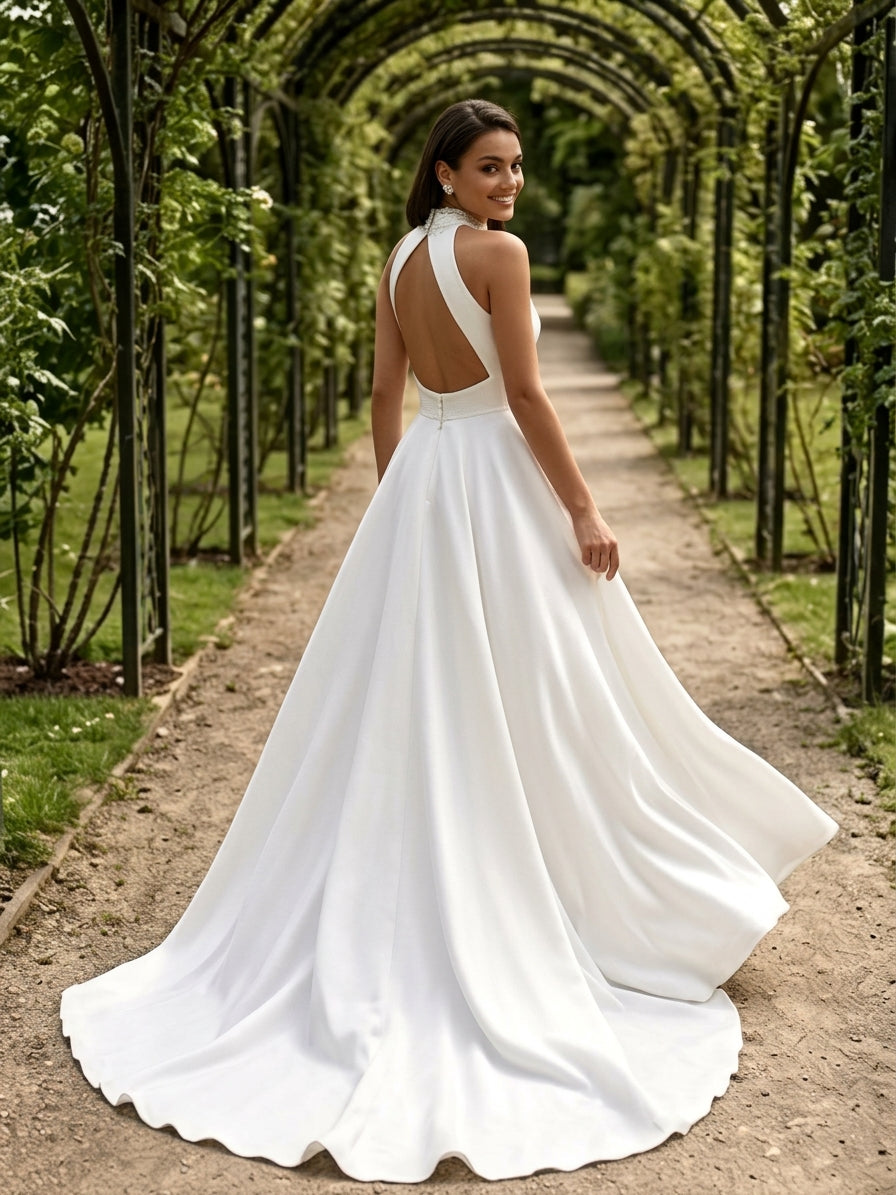 Lacey Bridal Ltd. Georgina A-line wedding gown with a high halter neck, pearl beading, and a striking back keyhole.