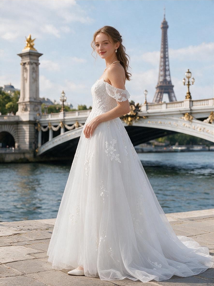 Lacey Bridal Ltd. GISELLE A-line wedding gown with off-the-shoulder lace straps and tulle skirt in Paris