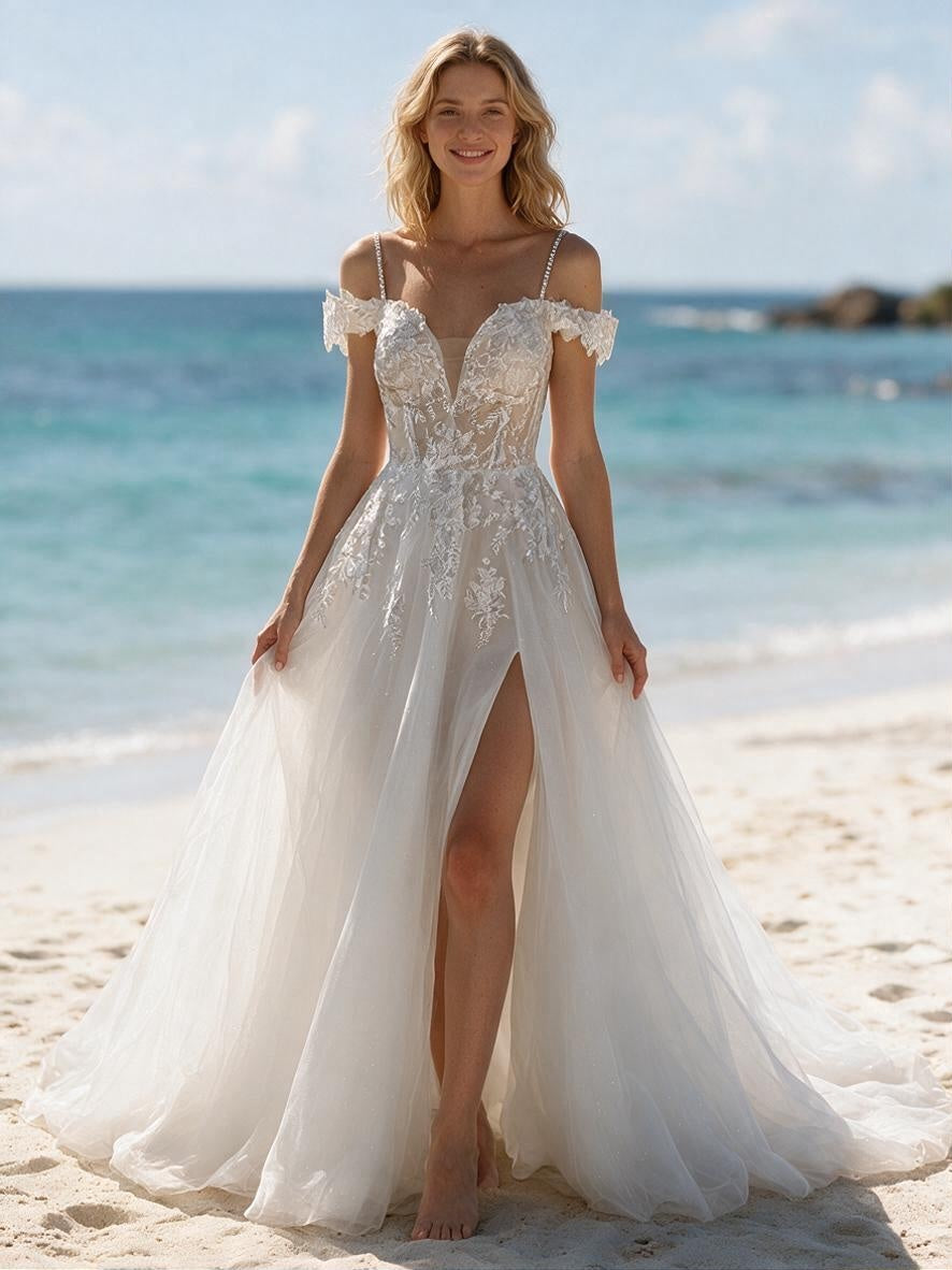 Lacey Bridal Ltd. Isabella A-line wedding gown with floral embroidery, cold-shoulder lace cuffs, and tulle skirt.