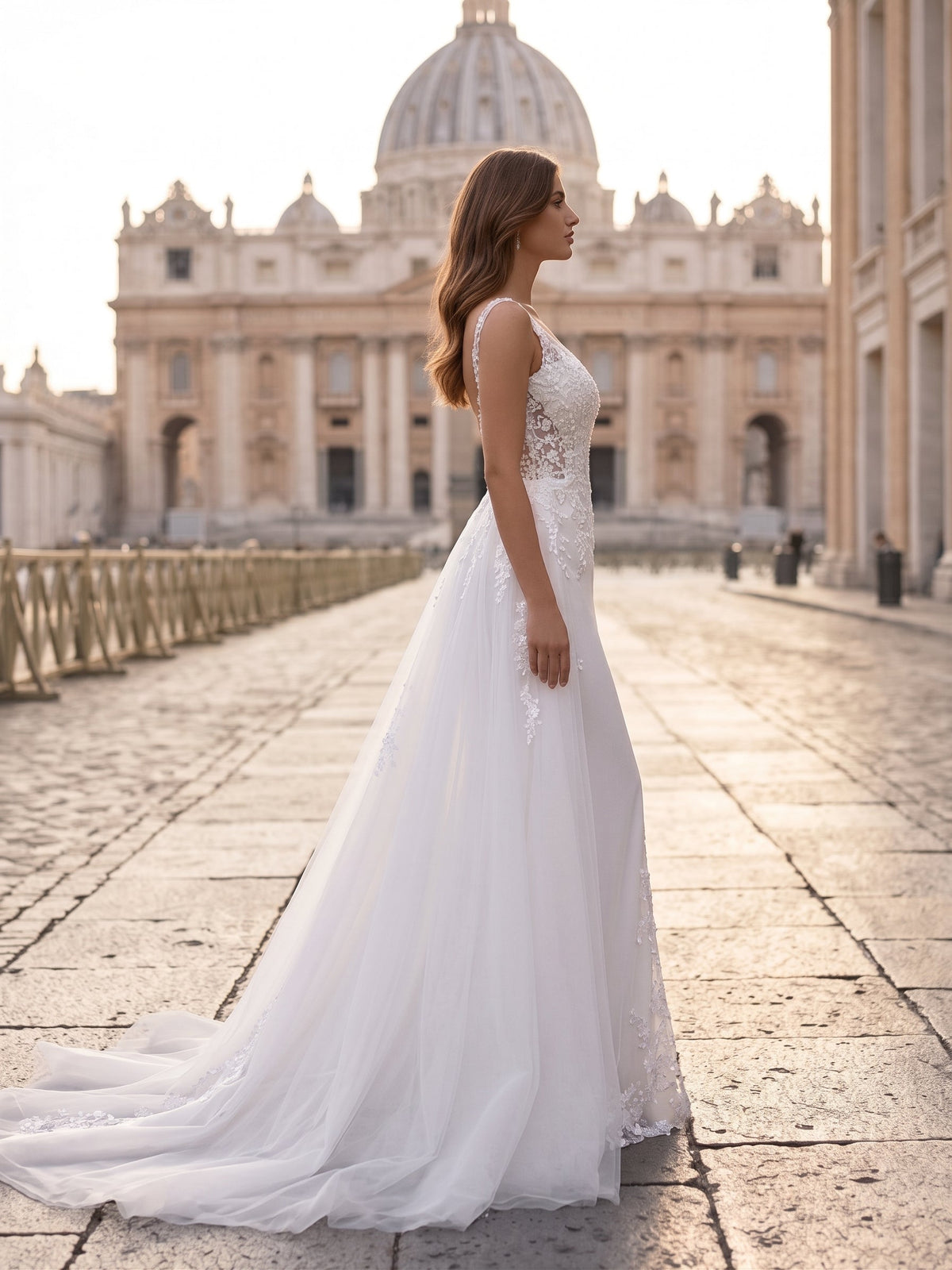 Lacey Bridal Ltd. Jacqueline two-way wedding gown with lace bodice and detachable tulle skirt in a Roman piazza setting