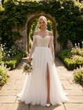 Lacey Bridal Ltd. JULIANA A-line wedding gown with beaded corset bodice, off-shoulder neckline, and tulle skirt.