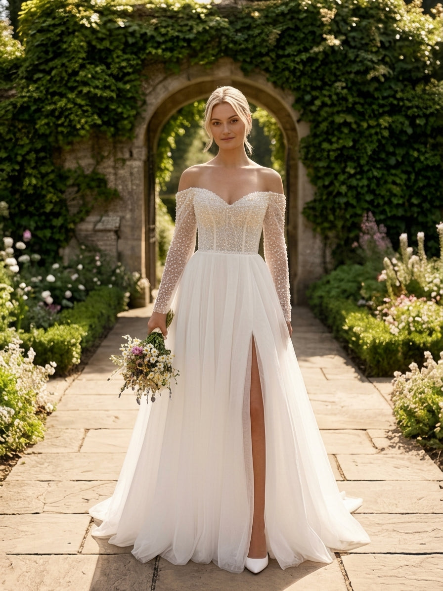 Lacey Bridal Ltd. JULIANA A-line wedding gown with beaded corset bodice, off-shoulder neckline, and tulle skirt.