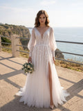 Lacey Bridal Ltd. Lucinda A-line wedding gown with floral lace bodice, sheer sleeves, and tulle skirt with thigh split.