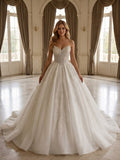 Lacey Bridal Ltd. Nerissa strapless ball gown with beaded sweetheart bodice and full tulle skirt in a grand ballroom.