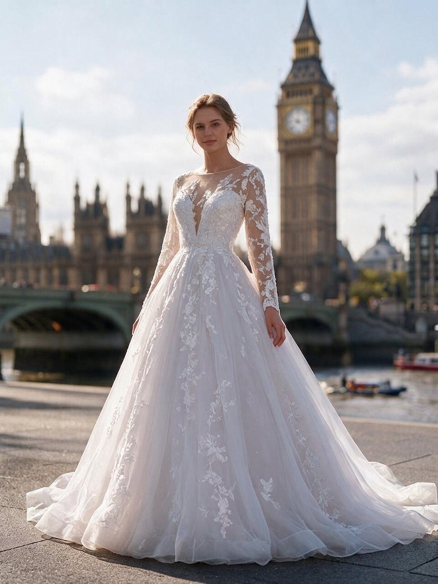 Lacey Bridal Ltd. Octavia A-line wedding gown with long illusion sleeves, botanical lace, and shimmer tulle skirt.