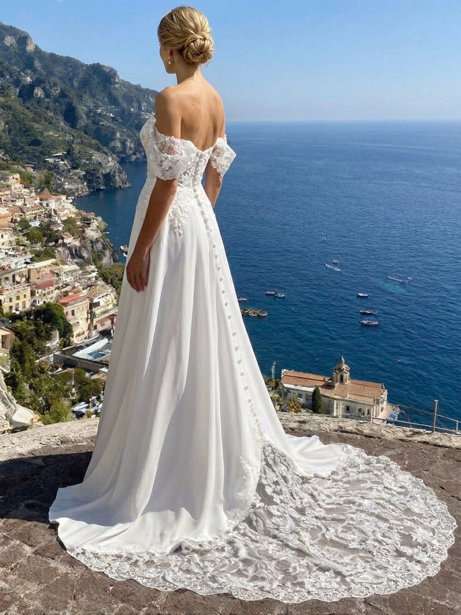 Lacey Bridal Ltd. Penelope A-line wedding dress with off-the-shoulder lace sleeves and illusion floral lace train.