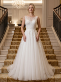 Lacey Bridal Ltd. PHILIPPA A-line wedding gown with illusion bateau neckline, damask lace bodice, and tulle skirt.