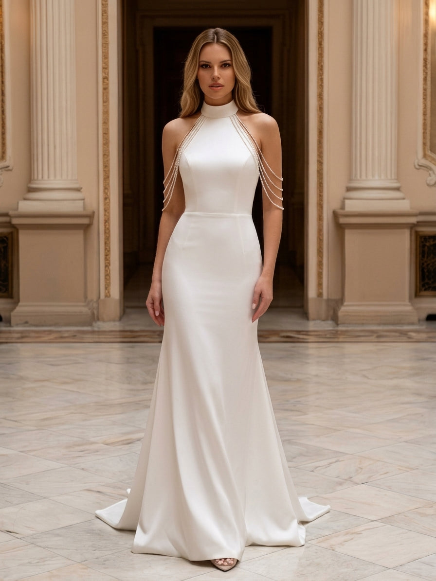 Lacey Bridal Ltd. PRIMULA mermaid wedding gown in white stretch satin with a halter neck and cascading pearl strands.