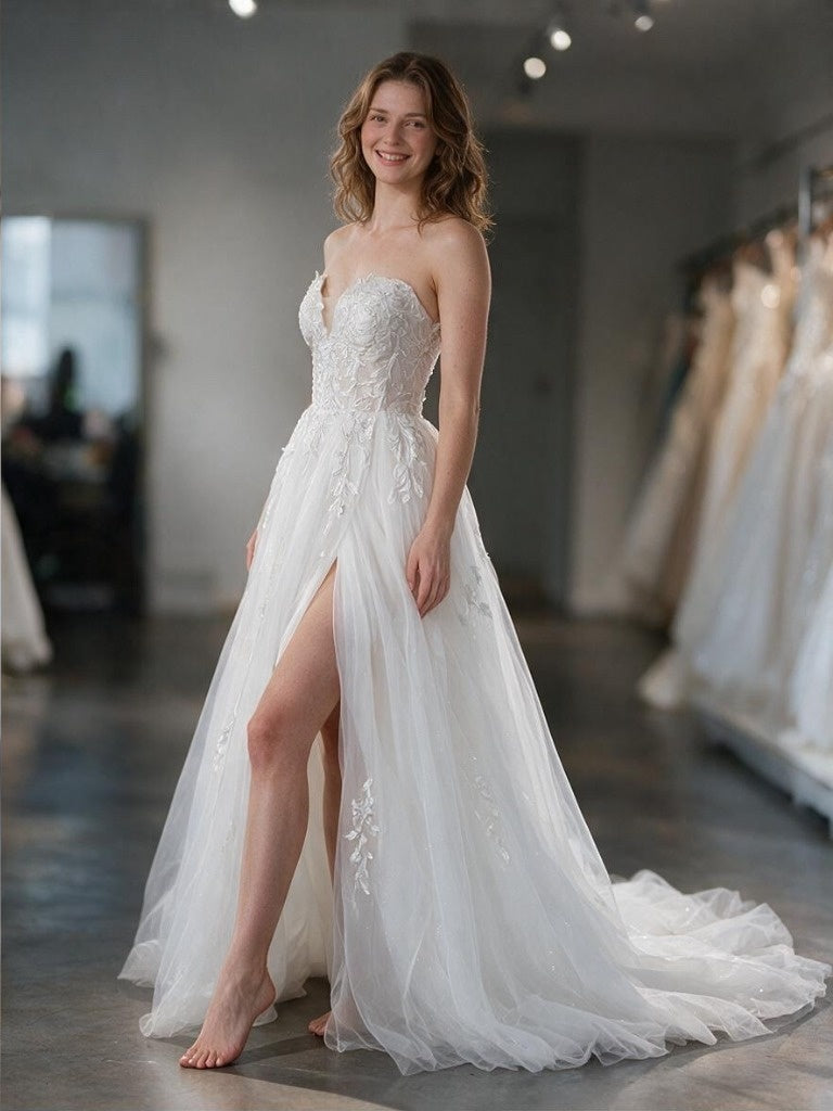 Lacey Bridal Ltd. Rosalind A-line wedding gown with strapless sweetheart neckline, lace bodice, and glitter tulle skirt