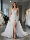 Lacey Bridal Ltd. Rosalind A-line wedding gown with strapless sweetheart neckline, lace bodice, and glitter tulle skirt.