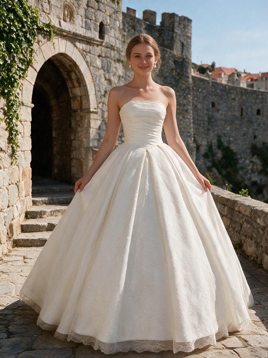Lacey Bridal Ltd. SABINA strapless ivory ballgown with ruched bodice and textured jacquard tulle skirt