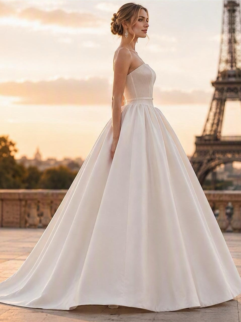 Lacey Bridal Ltd. strapless satin ballgown with pleated corset bodice and voluminous skirt in front of Eiffel Tower