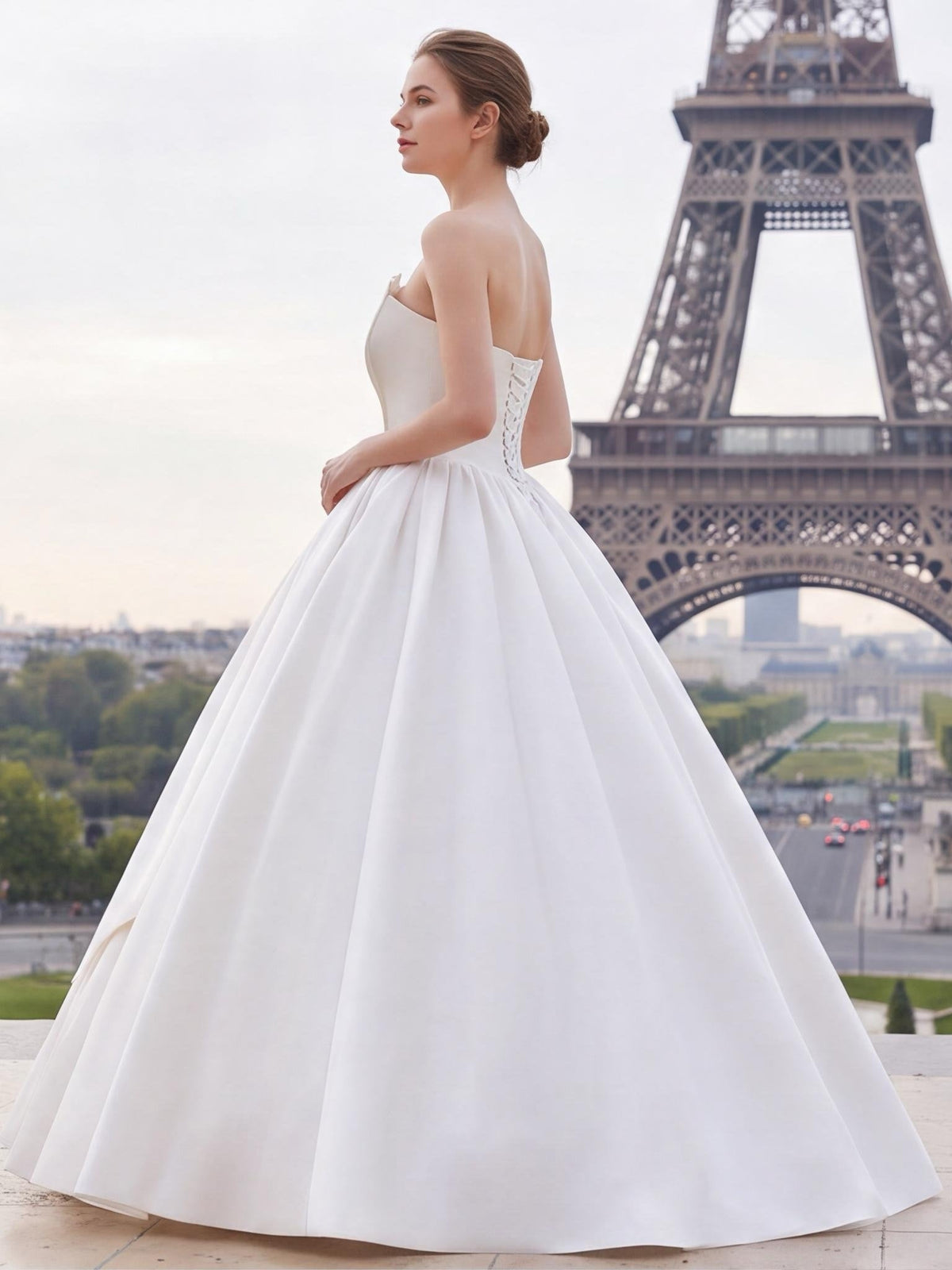 Lacey Bridal Ltd. Lysandra strapless satin ballgown with corset back and architectural folded neckline in Paris