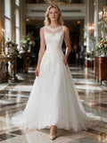 Lacey Bridal Ltd. SYLVIA sleeveless A-line wedding gown with illusion neckline, lace bodice, and flowing tulle skirt.