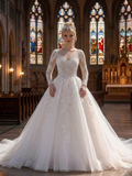 Lacey Bridal Ltd. VICTORIA ball gown with long illusion lace sleeves, beaded bodice, and voluminous tulle chapel train.