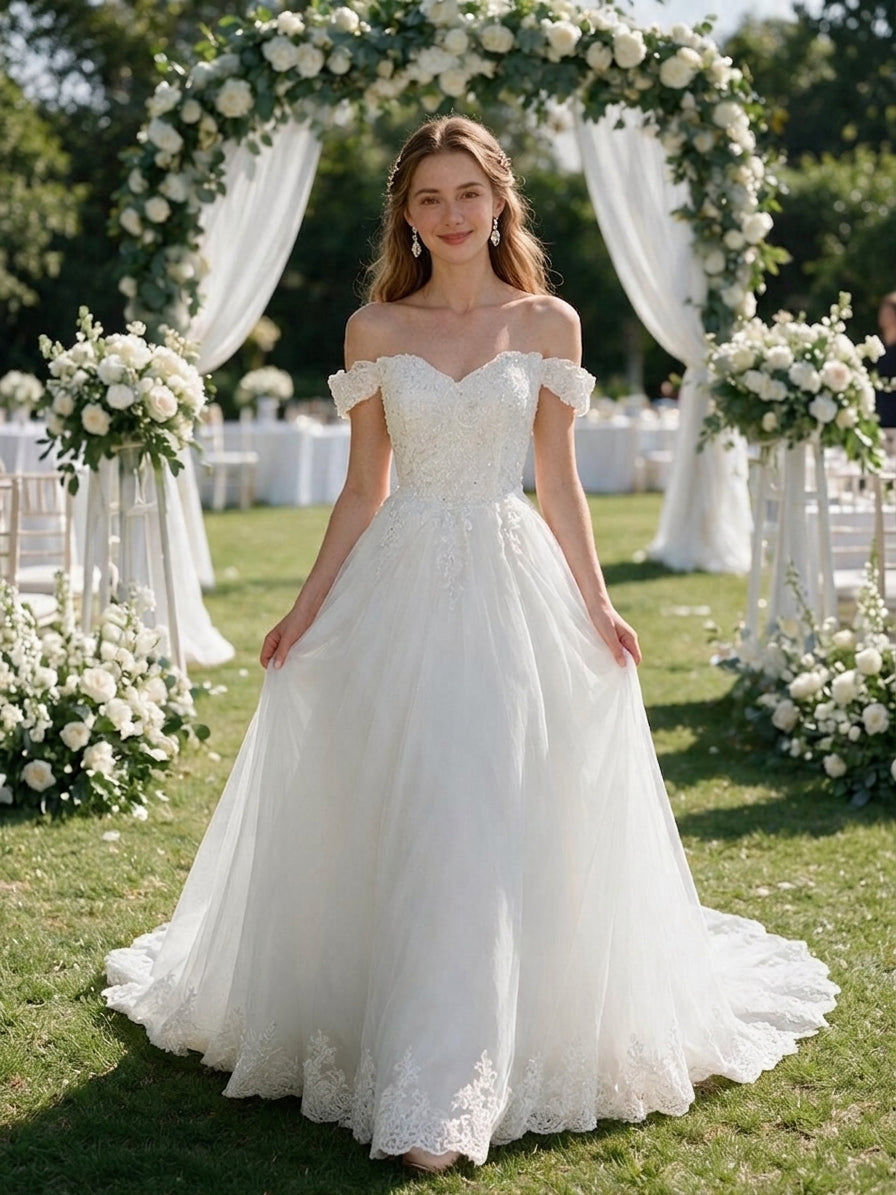 Lacey Bridal Ltd. VIOLETTA A-line wedding gown with off-the-shoulder lace sleeves and shimmering tulle skirt in garden