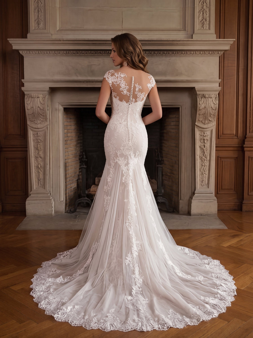 Lacey Bridal Ltd. Yolanda mermaid wedding gown with illusion back, floral lace appliqué, and scalloped train.